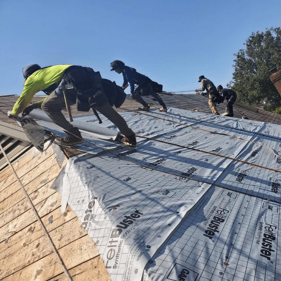 Revival Roofing team in action